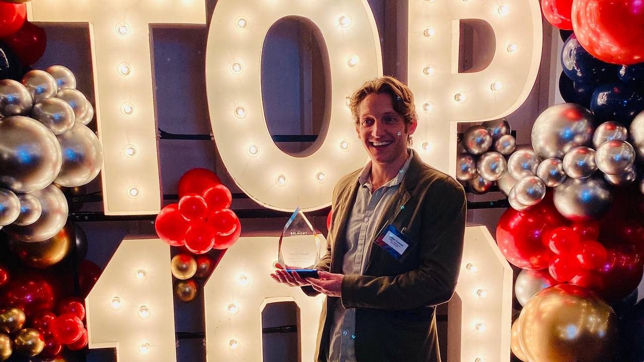 Logan Crowell accepting the 2022 Industry Impact Award